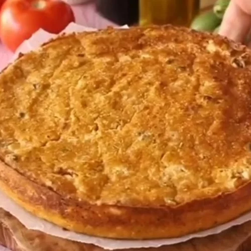 Καλοκαιρινή ντοματόπιτα για να μοσχοβολήσει το σπίτι: Με φέτα, χωρίς φύλλο