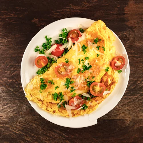 Ομελέτα με ντομάτες και φέτα (109 θερμίδες)