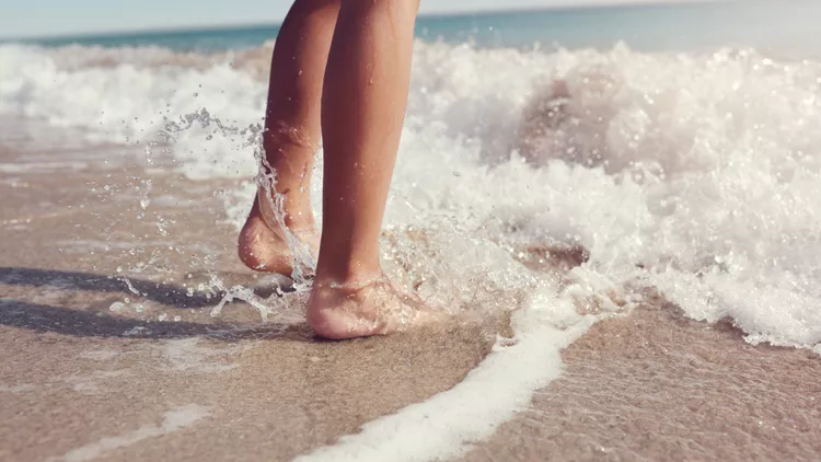 foot and sand