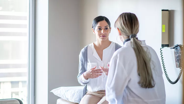 woman visiting doctor