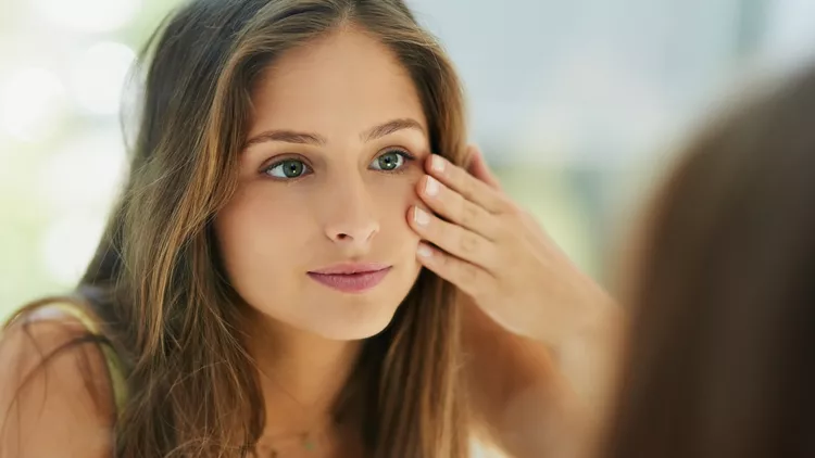 young woman mirror