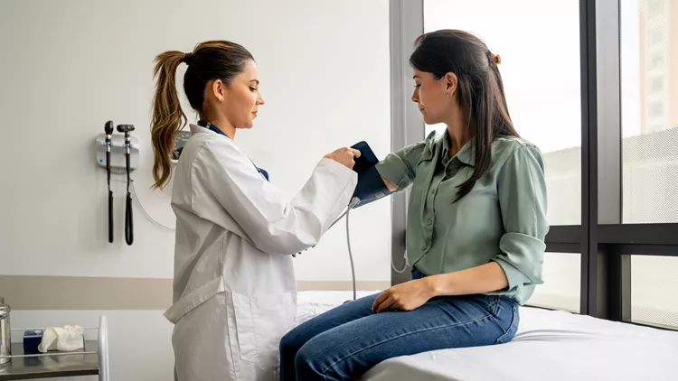 woman visiting doctor