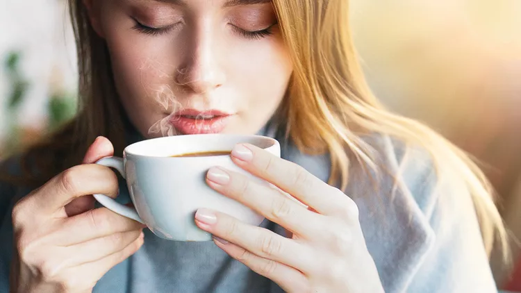 woman drinking coffee