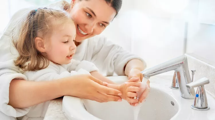 woman bathroom water