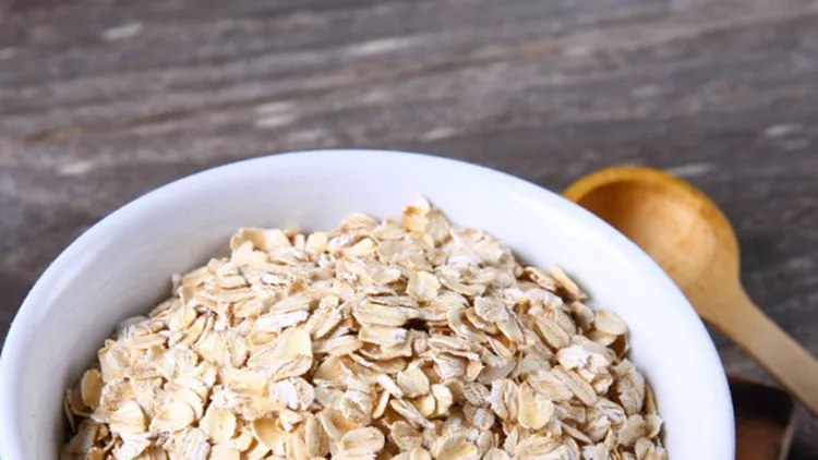 oat-flakes-in-a-glass-bowl-picture-id899796524