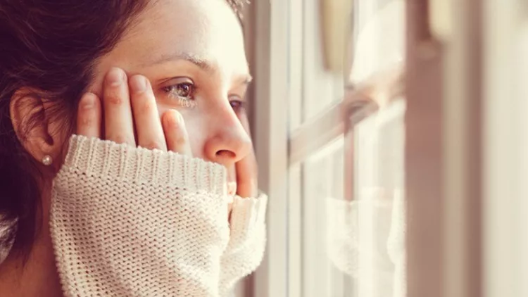 girl-looking-through-the-window-picture-id540961086