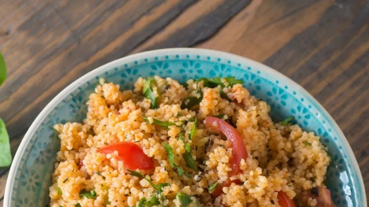 couscous-with-tomatoes-and-basil-picture-id500753068