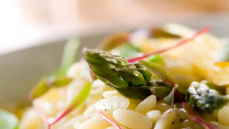 orzo-pasta-salad-with-fresh-vegetables-and-herbs-picture-id183817755
