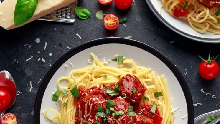 spaghetti-pasta-meatballs-with-tomato-sauce-basil-herbs-parmesan-on-picture-id930776884 (1)