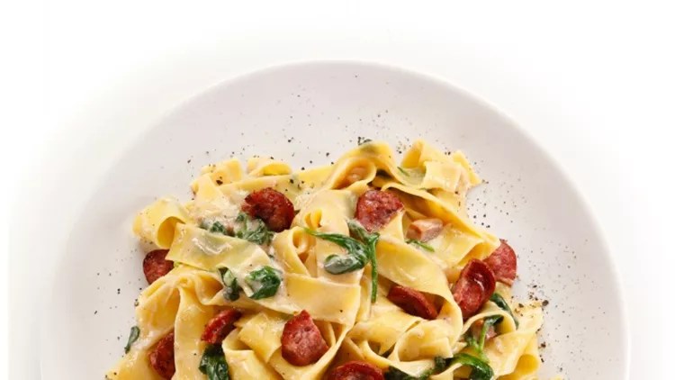pasta-with-spinach-and-sausages-picture-id687708648