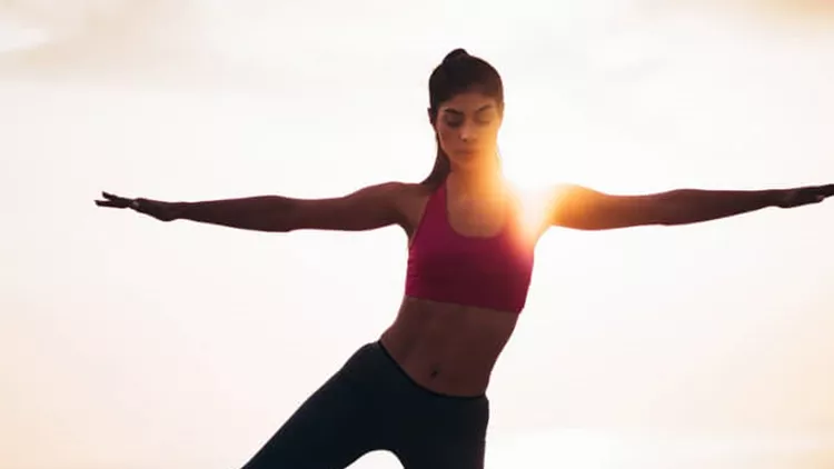 young-fit-woman-doing-balance-exercise-with-resistance-band-outdoors-picture-id667536996