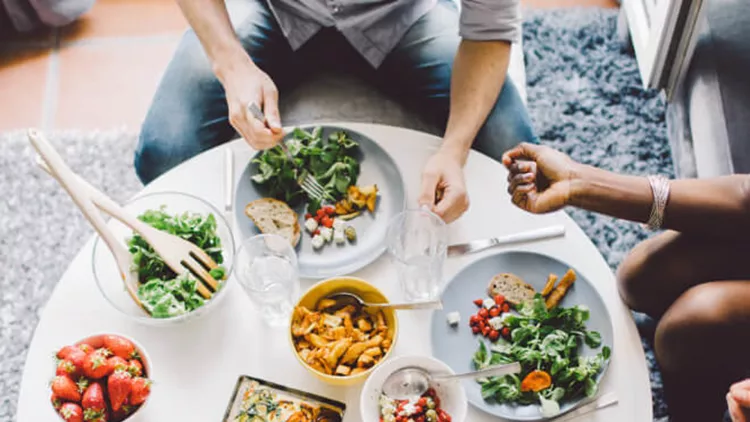 friends-enjoying-lunch-at-home-picture-id533834088