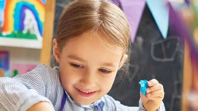 happy-little-girl-in-development-school-picture-id866028730