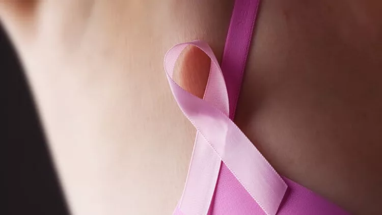 Woman with Pink Ribbon and Bra- Breast Cancer Awareness