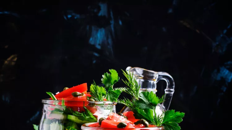 vegan-salad-with-vegetables-herbs-capers-and-olive-oil-picture-id660659864
