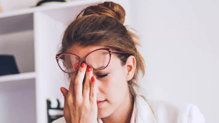 young-and-beautiful-businesswoman-tired-from-work-in-the-office-picture-id610229380