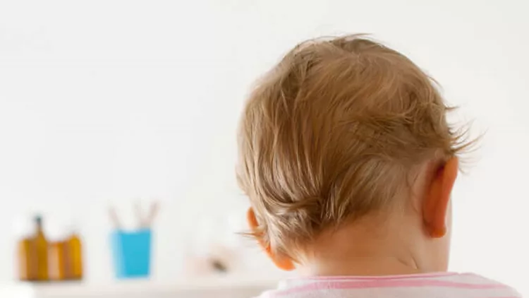 baby-girl-patient-receiving-vaccine-at-doctors-office-picture-id184836528