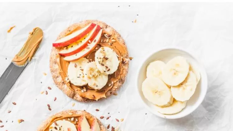 peanut-butter-apple-banana-flax-and-chia-seed-crackers-toast-on-a-picture-id898567014