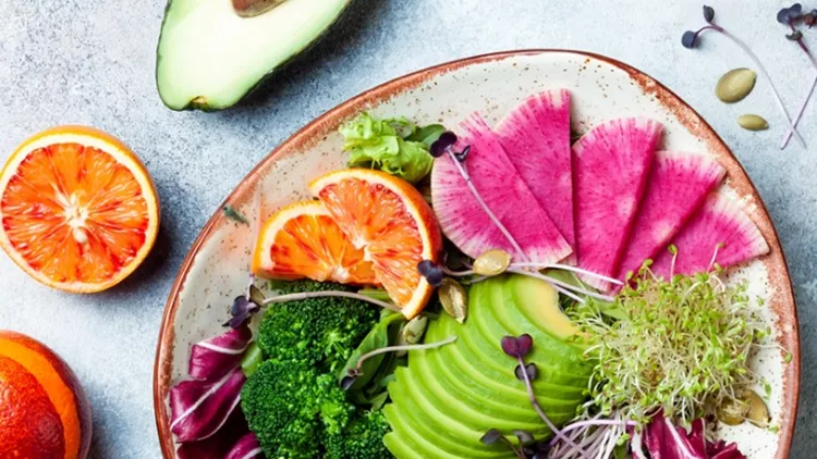 vegan-detox-buddha-bowl-with-quinoa-micro-greens-avocado-blood-orange-picture-id1141254251