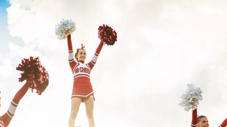 happiness-cheerleaders-posing-with-ponpon-picture-id471905943