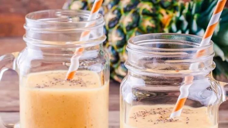 smoothie-with-banana-pineapple-and-chia-seeds-in-mason-jars-picture-id667817050 (1)