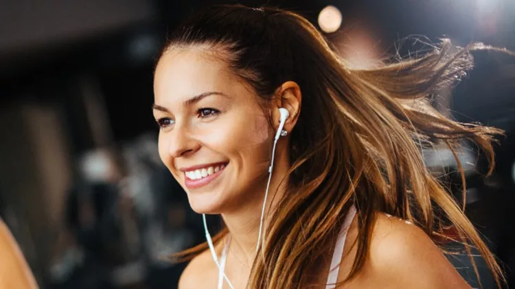 sporty-people-running-on-treadmills-in-a-health-club-picture-id1092140606