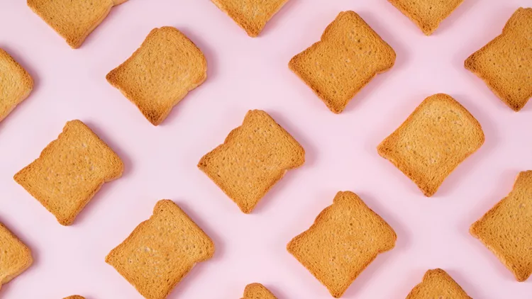 Slice of Toasted Bread on Pink Background