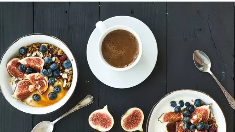 healthy-breakfast-set-bowls-of-oat-granola-with-yogurt-fresh-picture-id514067832