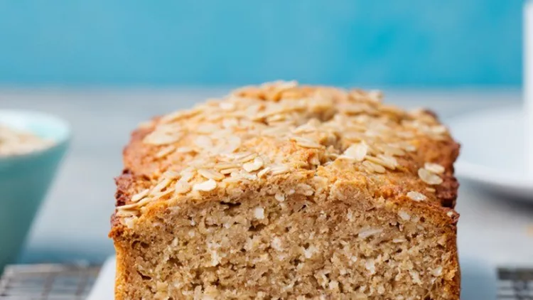 healthy-vegan-oat-coconut-loaf-bread-cake-on-cooling-rack-picture-id534892146