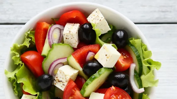 fresh-greek-salad-in-a-bowl-picture-id496093668 (1)