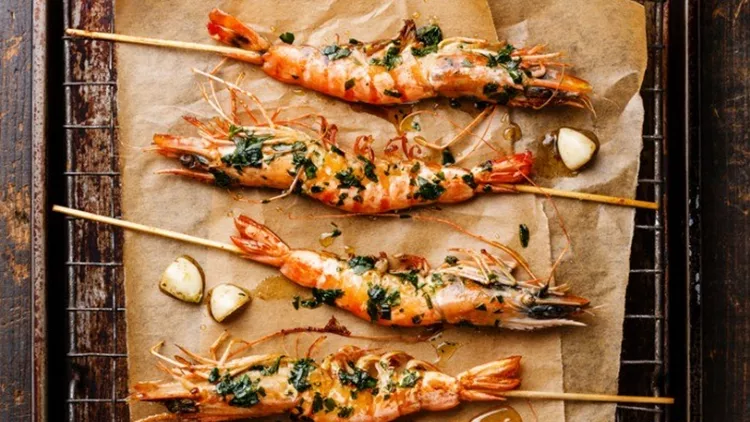 grilled-tiger-prawns-shrimps-on-skewers-picture-id583805932