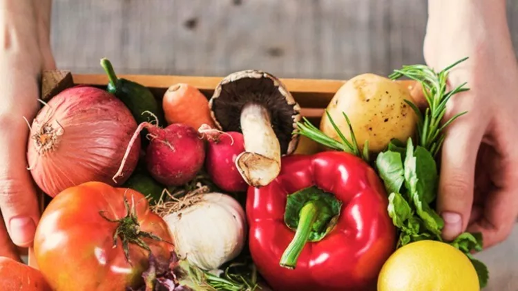 organic-vegetables-healthy-nutrition-concept-on-wooden-background-picture-id933093612