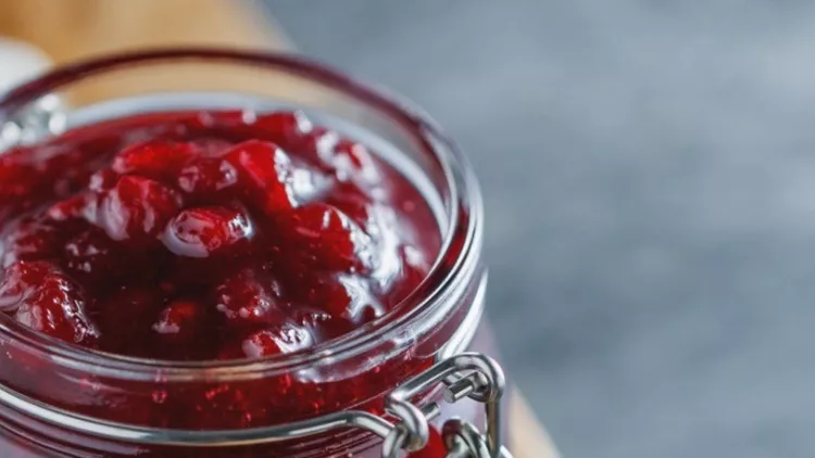 traditional-scandinavian-jam-with-cowberry-and-juniper-picture-id932390348
