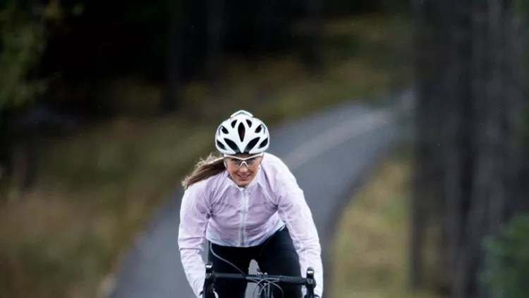 woman-rides-her-road-bike-along-the-trans-canada-trail-bikepath-near-picture-id864722142
