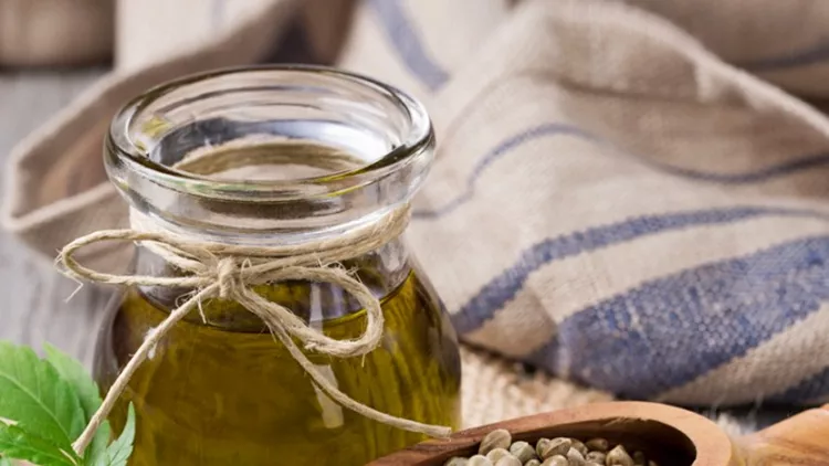 hemp-oil-n-a-glass-jar-picture-id521534856