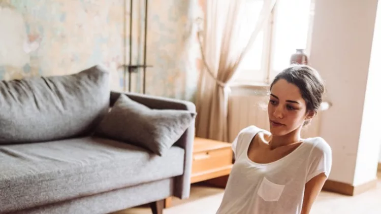 woman-doing-yoga-at-home-picture-id1130167685