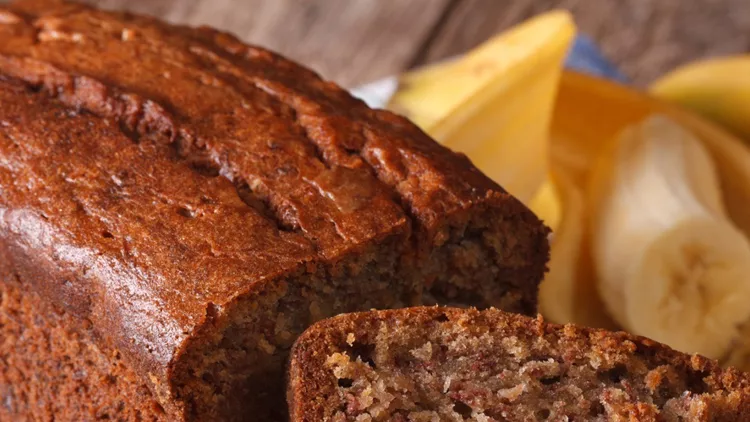 delicious-freshly-baked-banana-bread-on-a-table-closeup-horizo-picture-id498995950