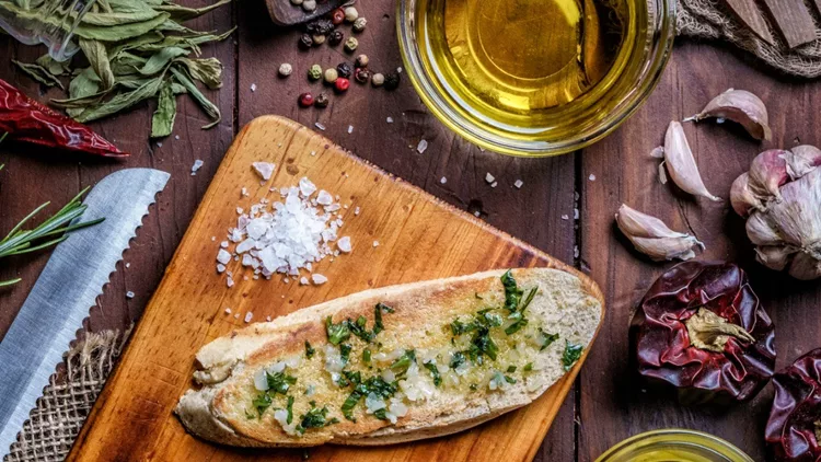 snack-or-appetizer-of-garlic-basil-and-olive-oil-bruschetta-on-table-picture-id1162537812 (1)