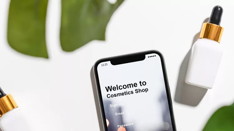design-of-the-smartphone-screen-application-of-cosmetics-online-white-picture-id1145724915