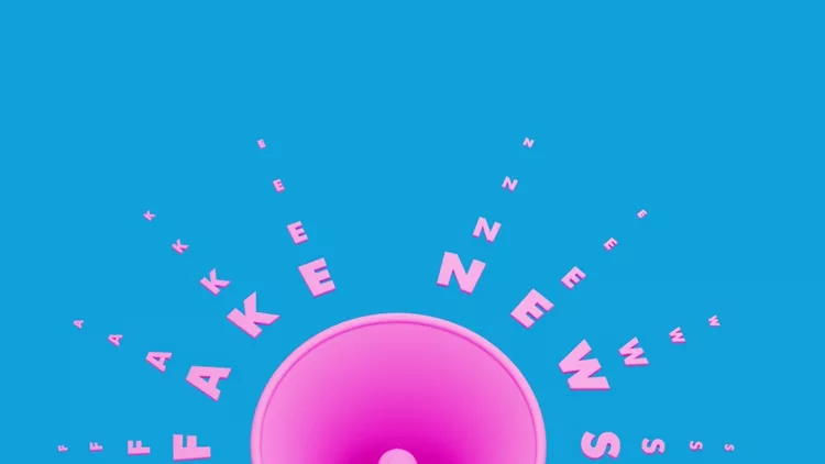 pink-megaphone-and-fake-news-text-over-blue-background-picture-id1196145559