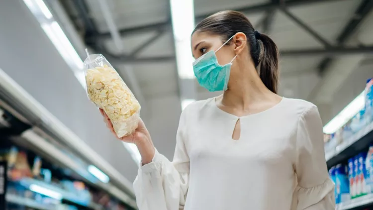 young-person-with-protective-face-mask-buying-groceriessupplies-in-picture-id1218501503