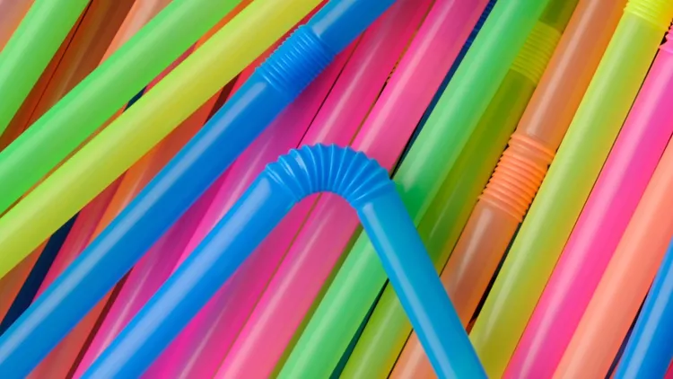 delicious-colorful-plastic-drinking-straws-bendable-flexible-rainbow-picture-id173593516