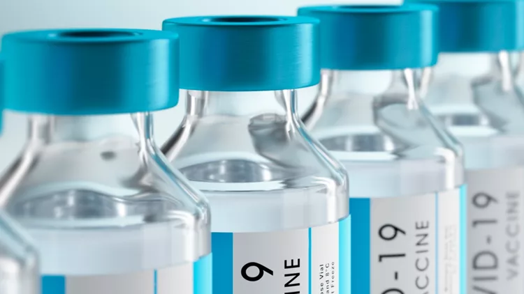 closeup-of-bottles-of-covid19-vaccine-picture-id1288583851