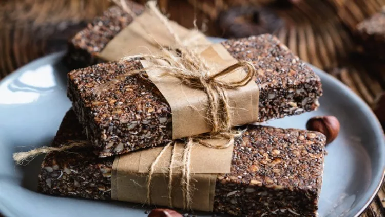 chocolate-chia-seeds-bars-with-hazelnuts-rolled-oats-dates-coconut-picture-id1092320822