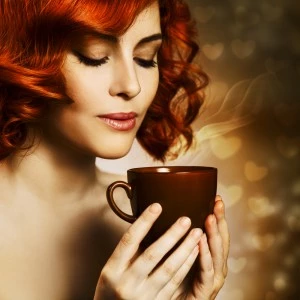 woman drinking hot coffee