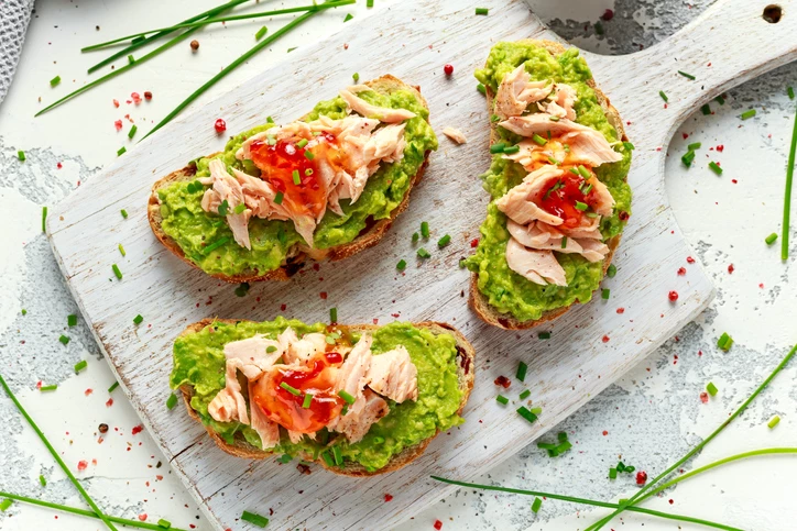 https://www.istockphoto.com/photo/homemade-toast-sandwich-with-salmon-avocado-and-chilli-jam-on-wihte-wooden-board-gm937723190-256466622